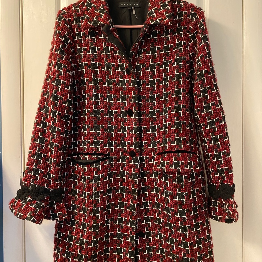 Very chic long blazer/jacket with a ruffle sleeve